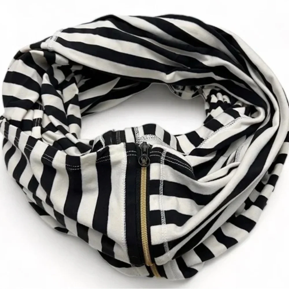 Lululemon black and white striped vinyasa scarf with gold zipper detail